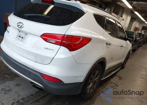 2014 Hyundai Santa Fe Sport 2.4L z USA, uszkodzony, nr VIN 5XYZU3LB9EG218191